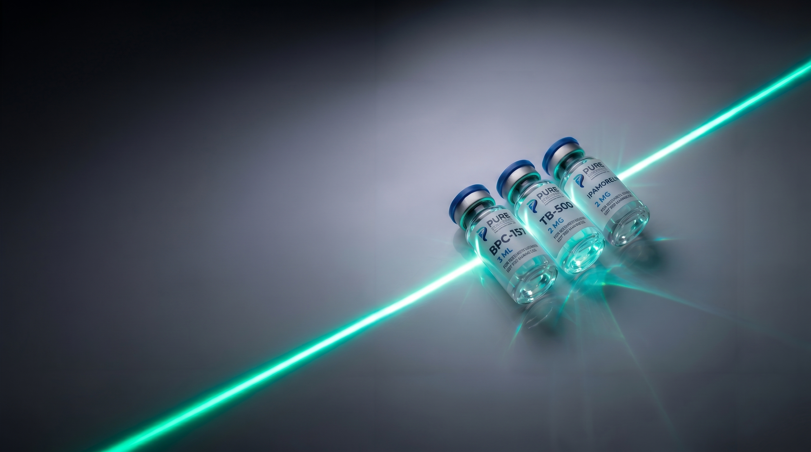 Research peptide vials illuminated by laser light